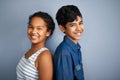 Happy family, siblings or portrait in studio, care and bonding together with love in childhood. Boy, girl and teenagers Royalty Free Stock Photo