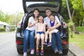 Happy family sitting in the car Royalty Free Stock Photo