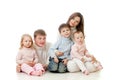 Happy family sitting looking sideways Royalty Free Stock Photo