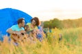 Happy family sitting near tent Royalty Free Stock Photo