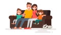 Happy family sitting on the sofa. Father, mother, son and daughter together on an isolated background. Royalty Free Stock Photo