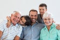 Happy family sitting on sofa Royalty Free Stock Photo