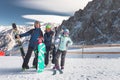 Happy family skiing at the mountains. Kids in ski school. Royalty Free Stock Photo