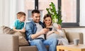 Happy family with smartphone at home Royalty Free Stock Photo