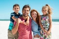 Happy family smiling at beach Royalty Free Stock Photo