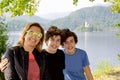 Happy family smiling at camera in lake bled ,Slovenia Royalty Free Stock Photo