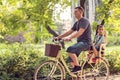 Happy family. Father and son riding bike in the park. Family sport and healthy lifestyle. Royalty Free Stock Photo