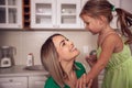 Happy family - Mother playing with her kid girl at home Royalty Free Stock Photo