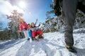 Family on snow have fun sledding on sunny winter day Royalty Free Stock Photo