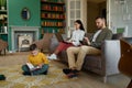 Happy family spending time at home together in evening Royalty Free Stock Photo