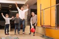 Happy family spending time together in bowling Royalty Free Stock Photo