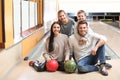 Happy family spending time together in bowling Royalty Free Stock Photo