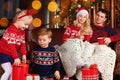 Young family celebrating Merry Christmas and Happy New Year Royalty Free Stock Photo