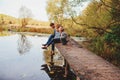 Happy family spending time together outdoor. Lifestyle capture, rural cozy scene Royalty Free Stock Photo