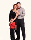 A  happy family on the studio light background Royalty Free Stock Photo