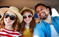 Happy   family  in summer auto journey travel by car on beach Royalty Free Stock Photo