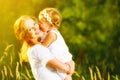 Happy family on summer. little girl child baby daughter hugging Royalty Free Stock Photo