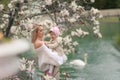 Happy family on a summer meadow. little girl child baby daughter hugging and kissing mother Royalty Free Stock Photo