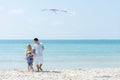 Happy family summer sea beach vacation. Asia young people lifestyle travel play kite enjoy Royalty Free Stock Photo