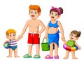 Happy family on summer vacation going to the beach Royalty Free Stock Photo