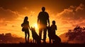 Happy family on sunset background, silhouettes of people and dogs, beagle and belgian shepherd malinois