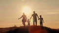 Happy family on sunset silhouette Royalty Free Stock Photo