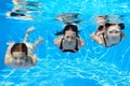 Happy family swim underwater in pool Royalty Free Stock Photo