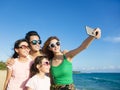 Happy family taking a selfie at the beach Royalty Free Stock Photo