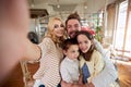 A happy family taking a selfie at home together. Family, leisure, together Royalty Free Stock Photo