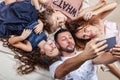 Happy family taking selfie picture with smartphone Royalty Free Stock Photo