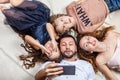 Happy family taking selfie picture with smartphone Royalty Free Stock Photo