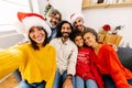 Happy family taking selfie portrait celebrating christmas together at home Royalty Free Stock Photo