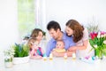 Happy family with three children enjoying breakfas Royalty Free Stock Photo