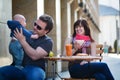 Happy family of three having breakfast Royalty Free Stock Photo