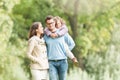 Happy family of three having fun outdoor. Royalty Free Stock Photo