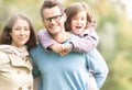 Happy family of three having fun outdoor. Royalty Free Stock Photo