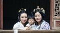 Happy family time, Chinese woman in Hanfu dress with baby girl