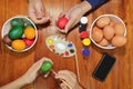 Happy family time during prepare eggs for easter day Royalty Free Stock Photo