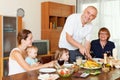 Happy family together over dining table Royalty Free Stock Photo