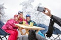 Happy family together at winter holiday on skiing Royalty Free Stock Photo