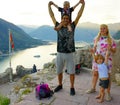 A happy family of 4 on the top of the mountain in Croatia