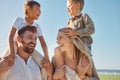 Happy family, travel and beach, kids relax on holiday while playing a shoulder game and having fun at the sea. Family Royalty Free Stock Photo