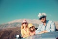 Happy family travel by car in the mountains Royalty Free Stock Photo