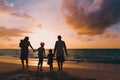 Happy family with tree kids walk at sunset beach Royalty Free Stock Photo