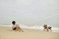 happy family with two kids on the beach