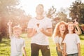 happy family with two kids playing with drone Royalty Free Stock Photo