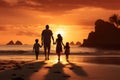 happy family with two kids walking on beach at beautiful sunset or sunrise, A happy family in walks hand in hand down a paradise Royalty Free Stock Photo