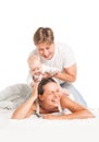 Happy family under blanket on the bed at home Royalty Free Stock Photo