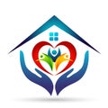 Happy Family union, love heart shaped hands care kids and care happy with home house roof shape logo. Royalty Free Stock Photo