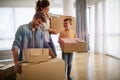 Happy family unpacking boxes in new home on moving day Royalty Free Stock Photo